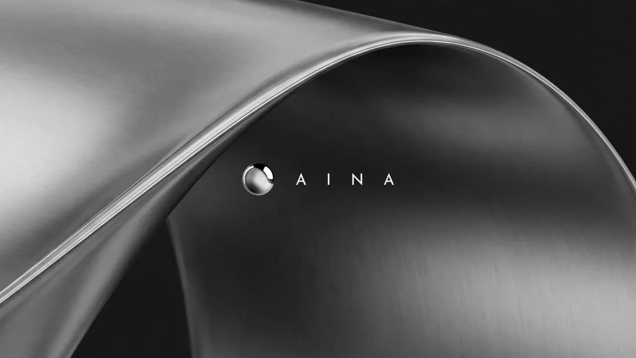 Aina banner showing the covered device the startup will reveal for its pilot program