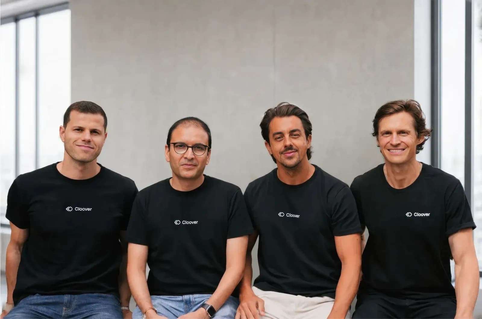 The Cloover team in company t-shirts