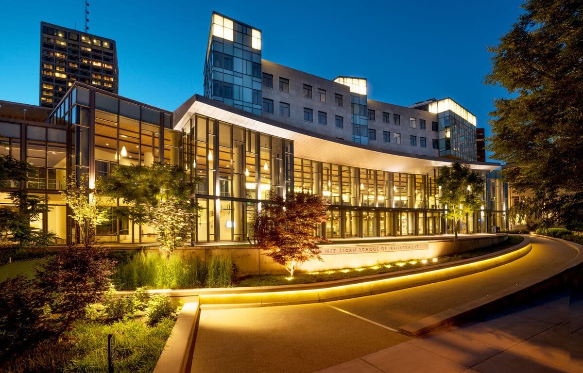 MIT Sloan School of Management building exterior at dusk