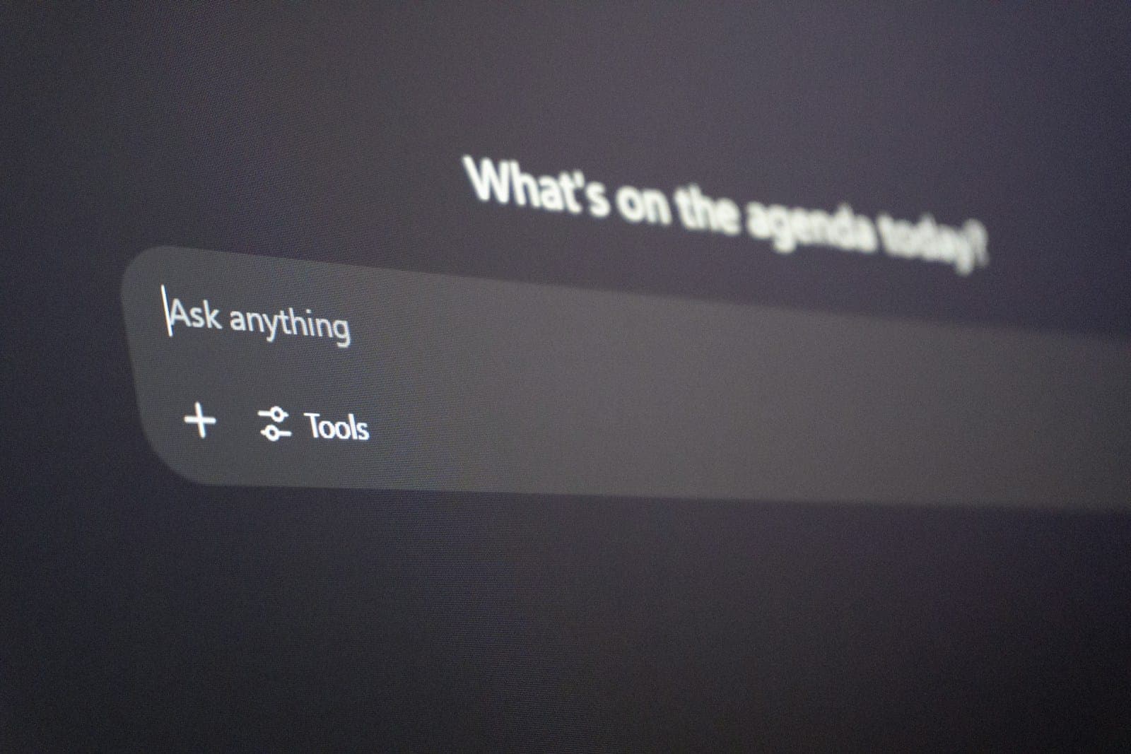 Digital interface with "ask anything" prompt.