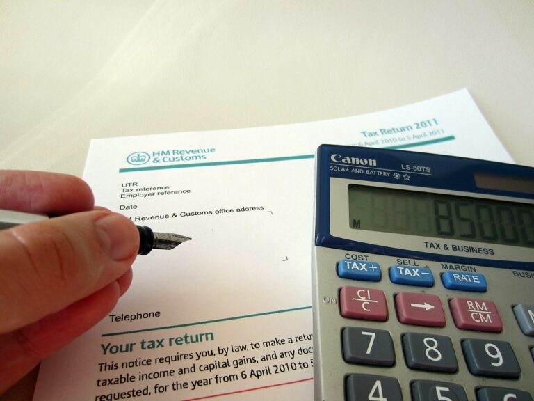 person completing tax return form.