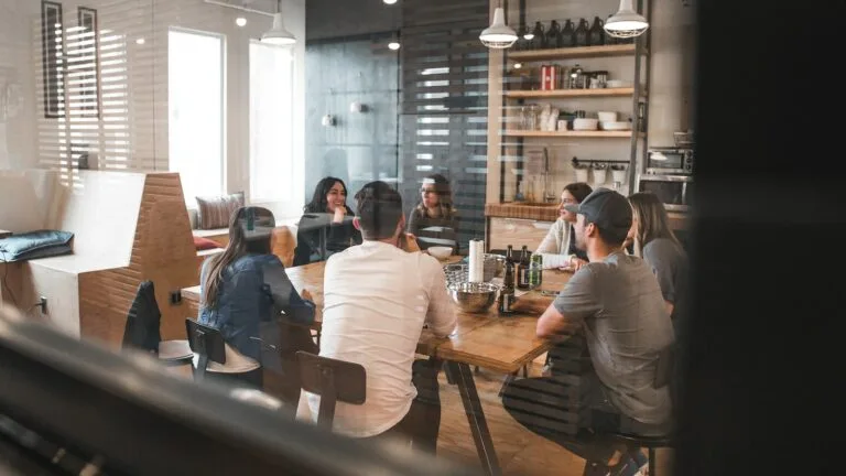 How to Connect with Your Audience By Building a Unique Brand & Story 4 people sitting on chair