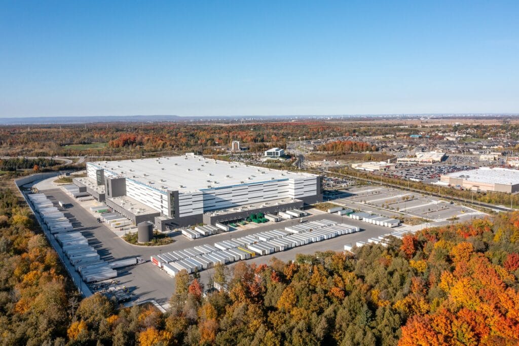 a large building with a parking lot