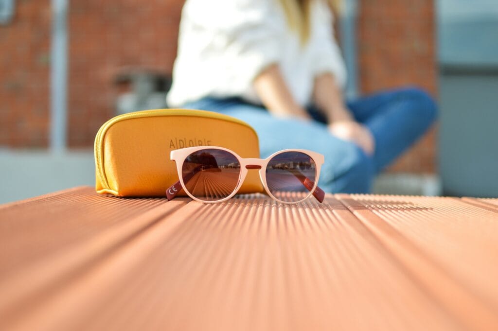 Technology's Influence on Fashion Trends 3 sunglasses beside a purse