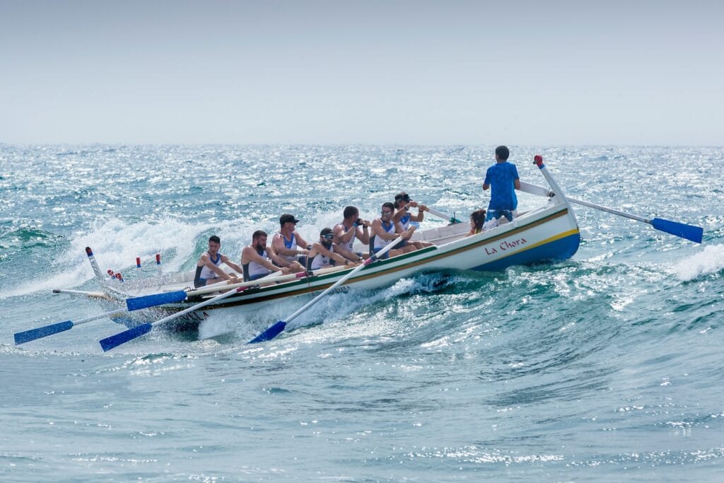 What is the Role of Happy Leadership in Corporate Happiness and Employee Satisfaction? 2 group of men riding boat