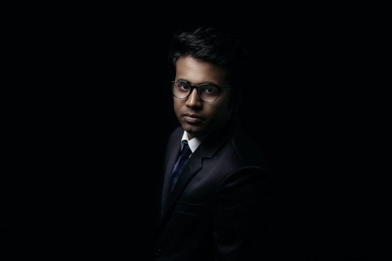 Inside an Executive Mind: The Hidden Power of Intuition in Decision-Making 5 man in black suit jacket wearing black framed eyeglasses
