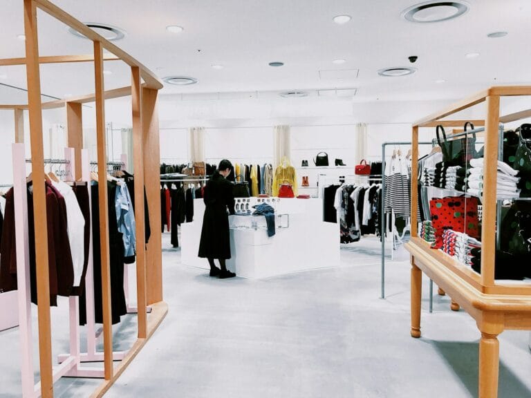 Shoplifting Offences in England and Wales Reach Highest Level in 20 Years 2 woman standing inside clothing area