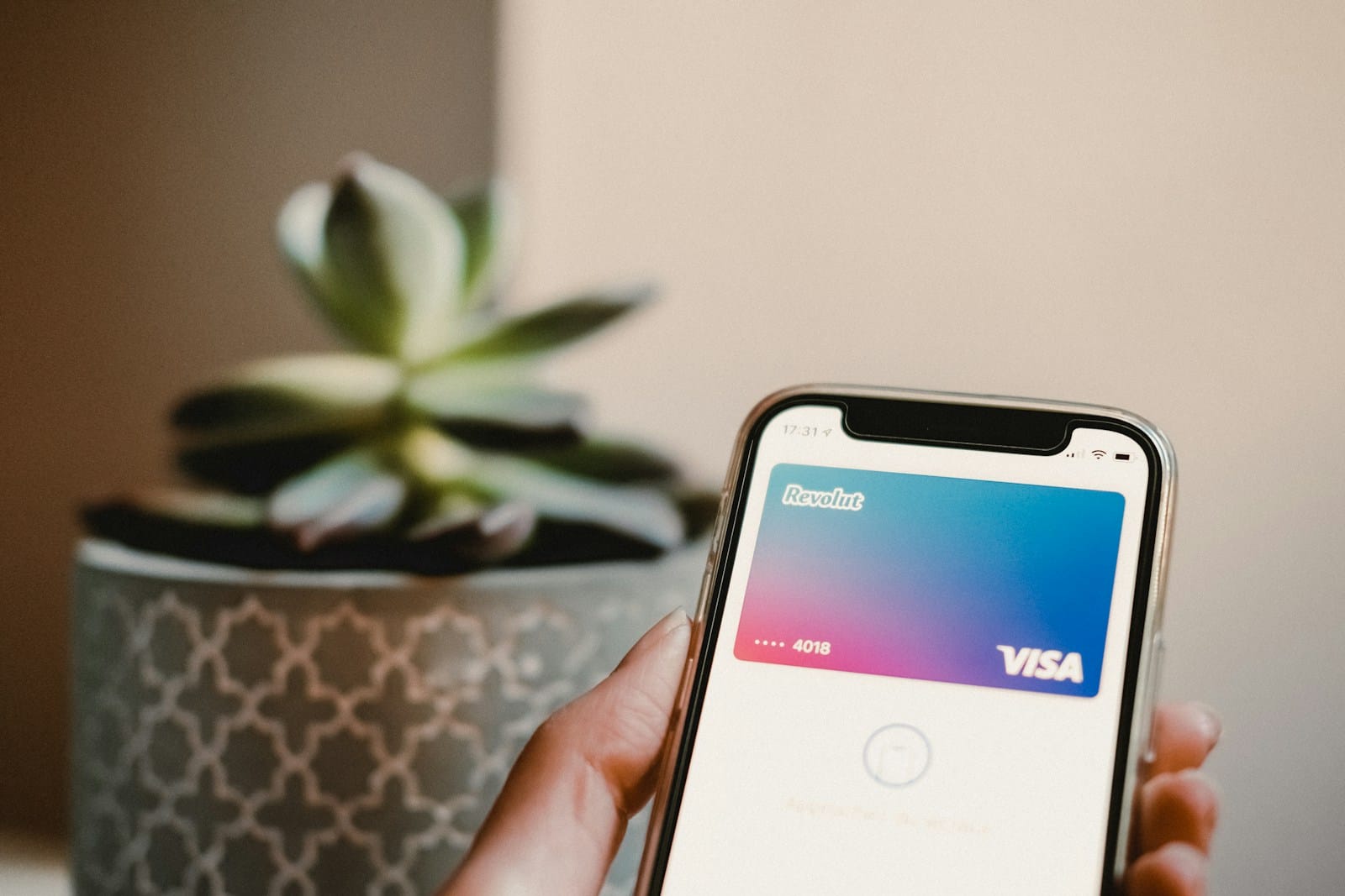 Revolut Introduces New Security Measures in Response to Rising Phone Muggings in London 1 person holding black samsung android smartphone