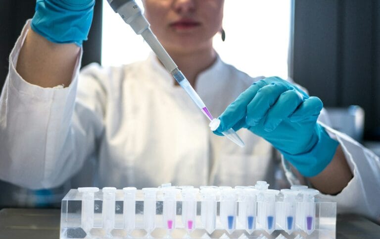 Laboratory Testing Standards Rise as Supplement Industry Faces Quality Scrutiny 8 person holding orange and white toothbrush