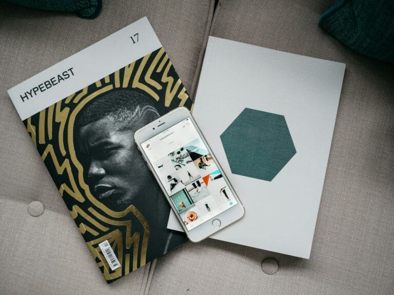 Print and Digital Publishing Success Stories Defy Industry Decline Predictions 7 silver iPhone 6 on book