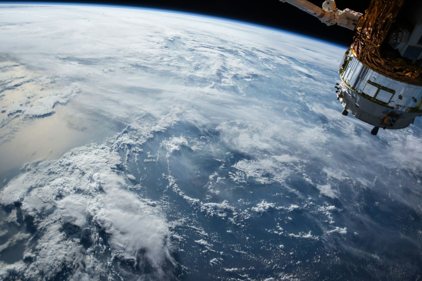 Space Economy Growth Accelerates as Global Conferences Shape New Frontiers 1 view of Earth and satellite