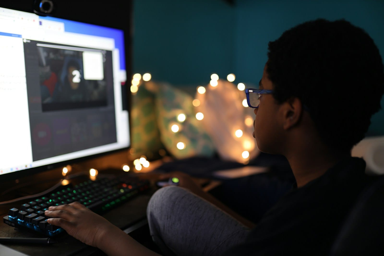 Gaming Technology Tackles Music Education's Motivation Crisis 1 man in black shirt using computer