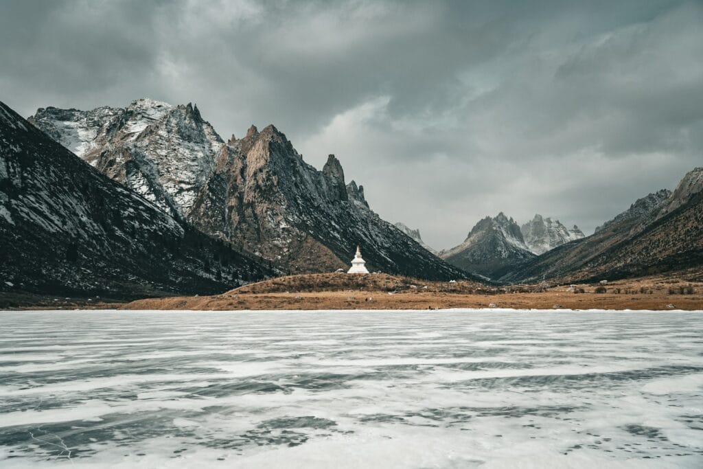 Global Copper Shortage Threatens Green Energy Goals As Demand Soars 2 a lake with a mountain in the background