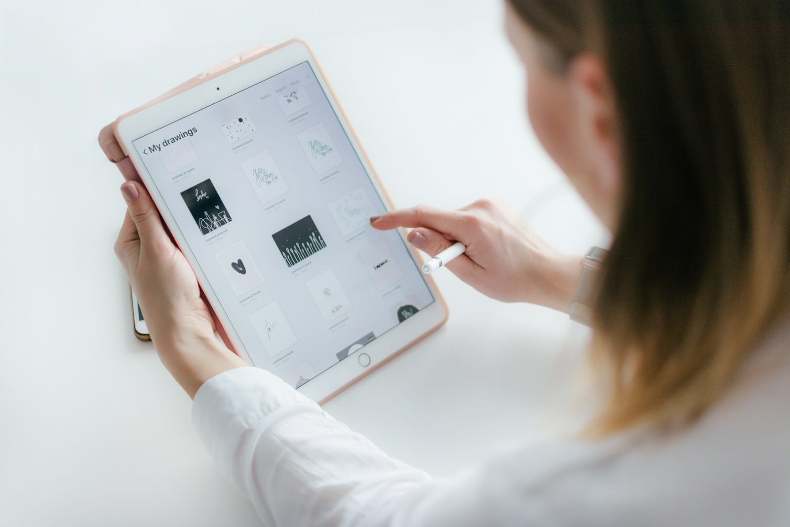 Beyond Compliance: What Healthcare Learnt About Trust From Digital Accessibility 1 woman using gold iPad