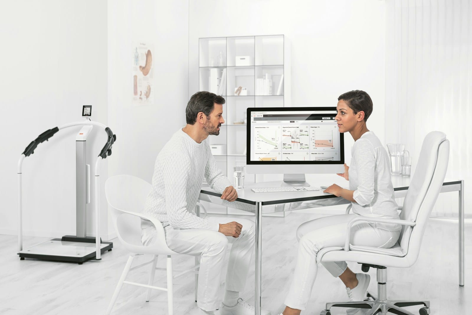 Can a New Payment Model Stop Rural Oncology Clinics from Closing? 1 man in white dress shirt sitting on white chair in front of computer