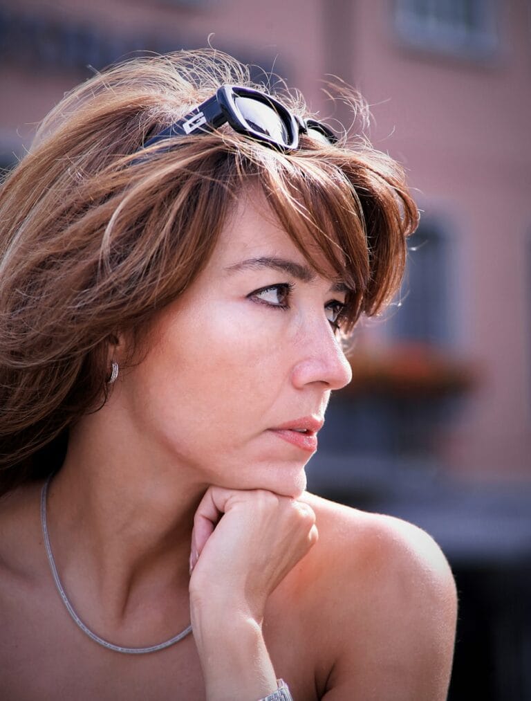 What's Next for Women's Hair Loss? New Cosmetic Trial Takes a Different Approach 2 a woman with a pair of goggles on her head