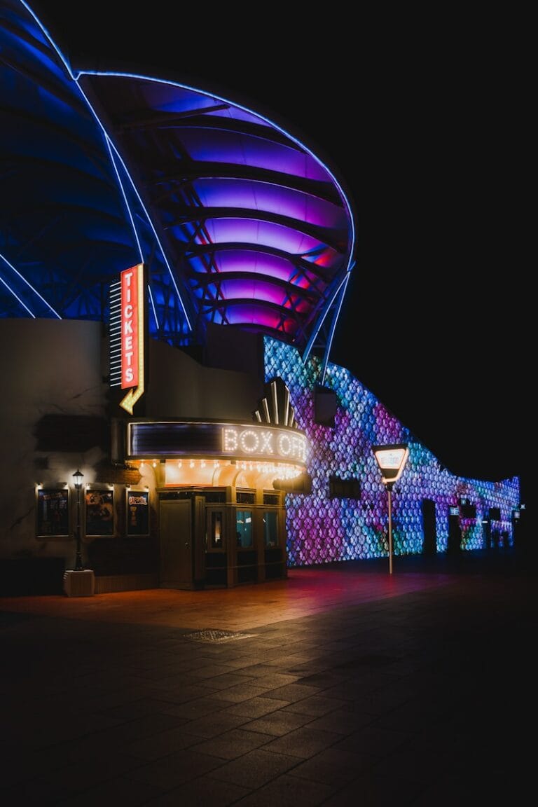 Italian Screenwriters Making Their Mark Building on Italian Genre Traditions 1 a building with a large neon sign
