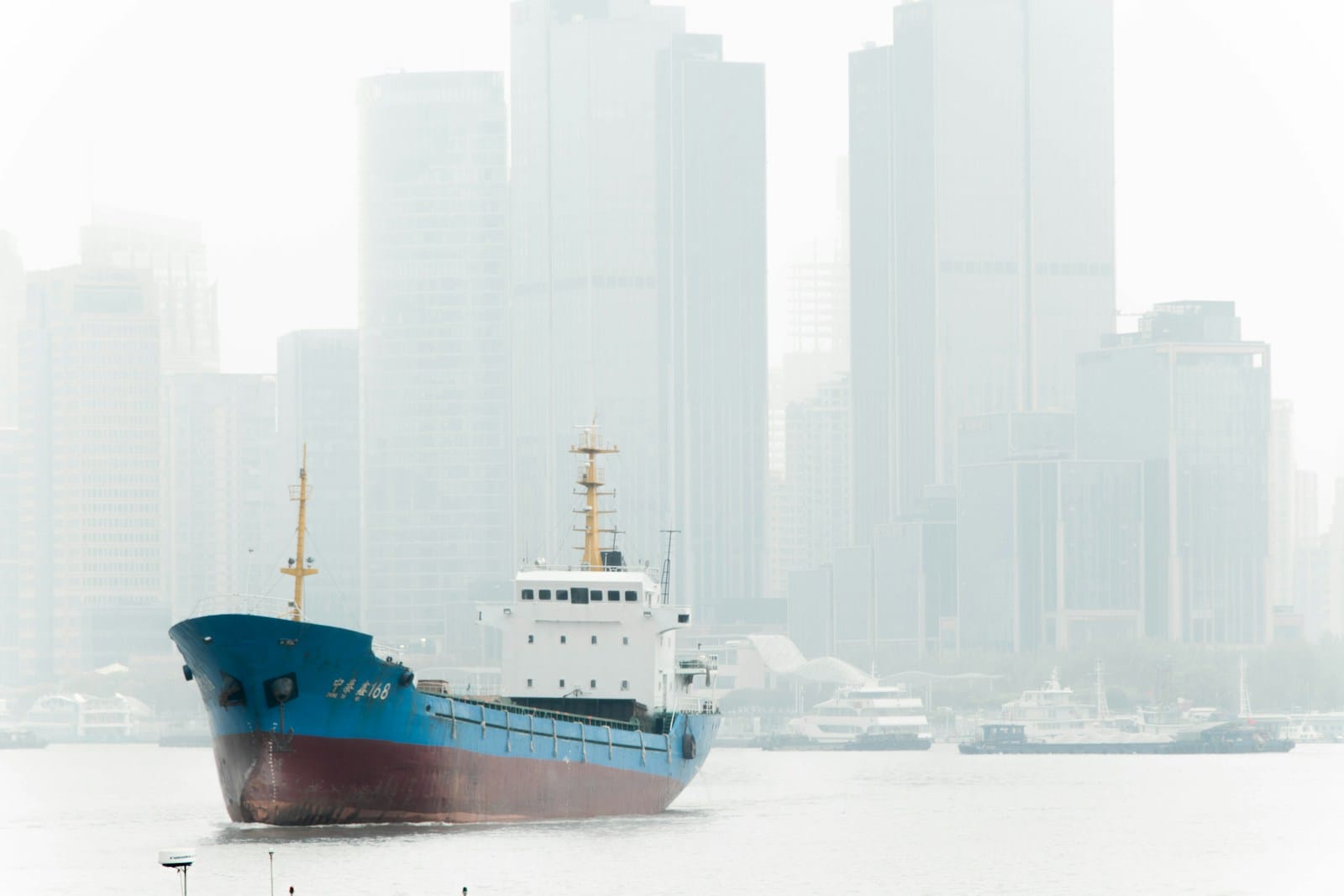 Why Global Shipping Container Firms Are Picking Smaller U.S. Markets 1 blue and white ship on white sand during daytime
